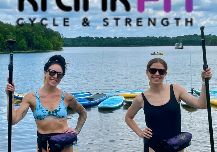 a group of people that are standing in the water