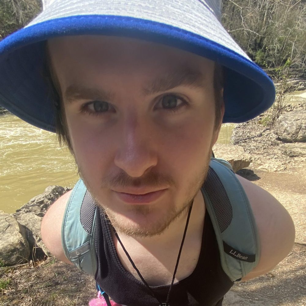 a little boy wearing a hat